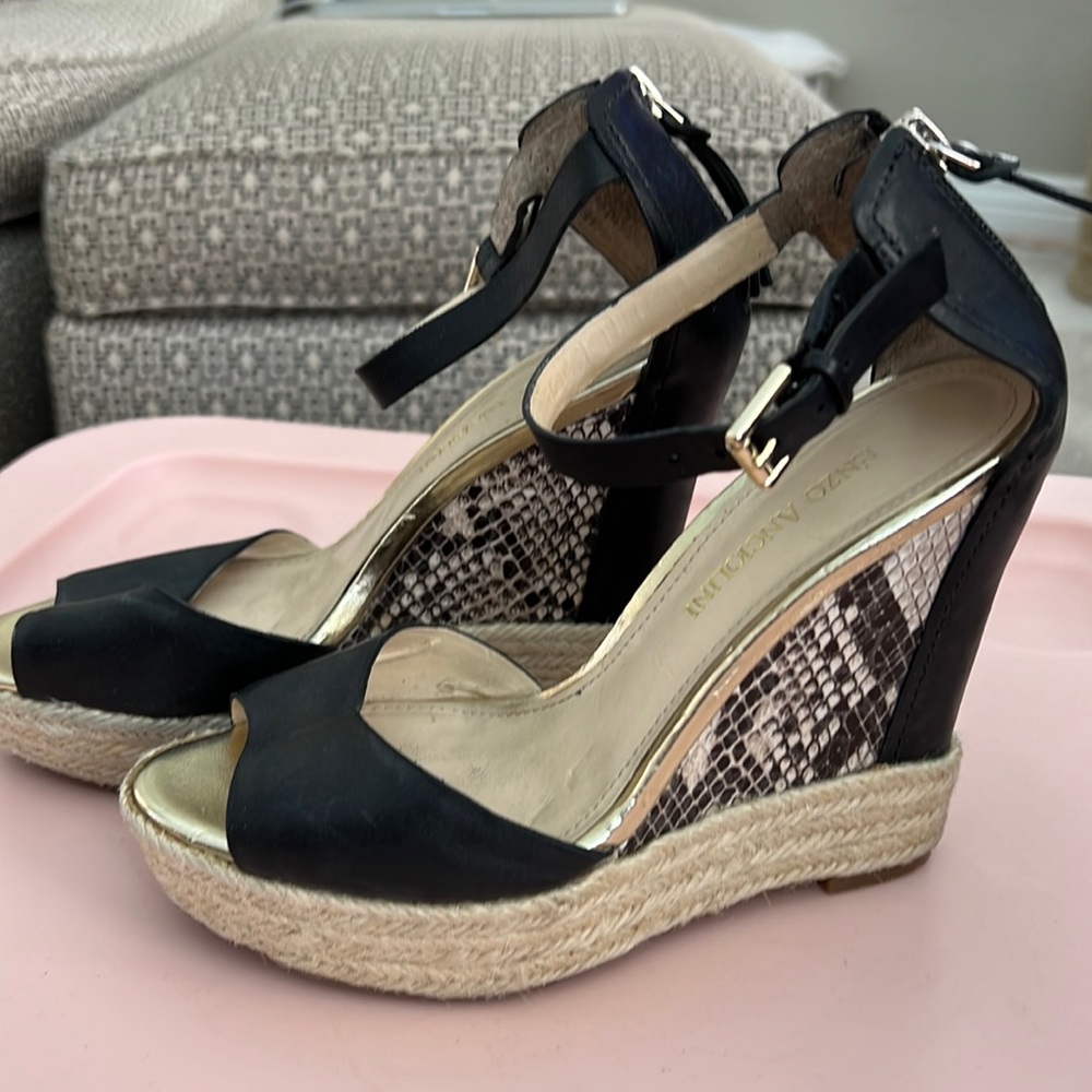 Enzo Angiolini black and snake print wedge.